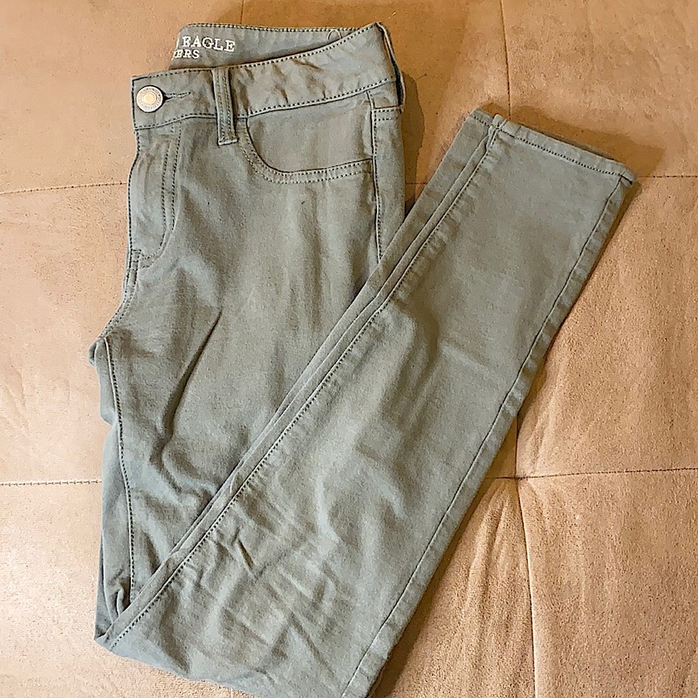 Green fabric AE jeggings reg rise